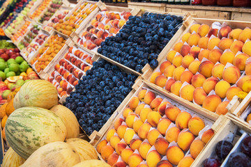 Assortment of fresh organic healthy fruits at the market