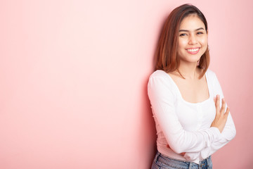 Fototapeta premium Beautiful university student is smiling on pink background