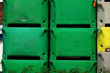 Stack of predominantly green boxes