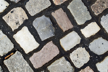 Obraz premium Close up view of cobblestone pavement
