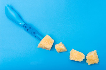 Tasty parmesan yellow cheese pieces