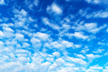 A huge blue sky with beautiful white clouds. Background with sky in the afternoon for.