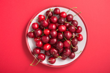 Sweet fresh cherries fruit on a plate