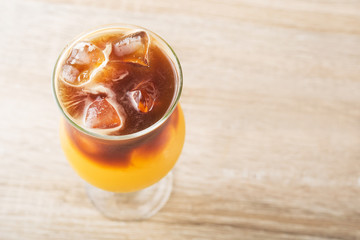Cold summer caramel cocktail with ice