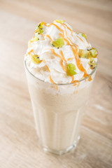 Sweet milk shake cocktail with kiwi