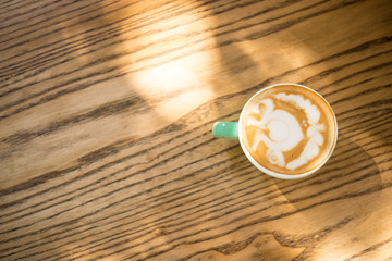 Italian cafe, turquoise color of cappuccino coffee cup