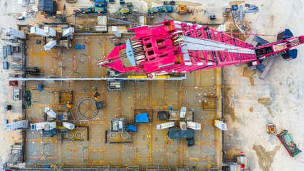 Aerial top view mobile crane on construction site, Red Mobile construction tower crane.