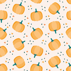 Seamless pattern with pumpkins, dots and hearts