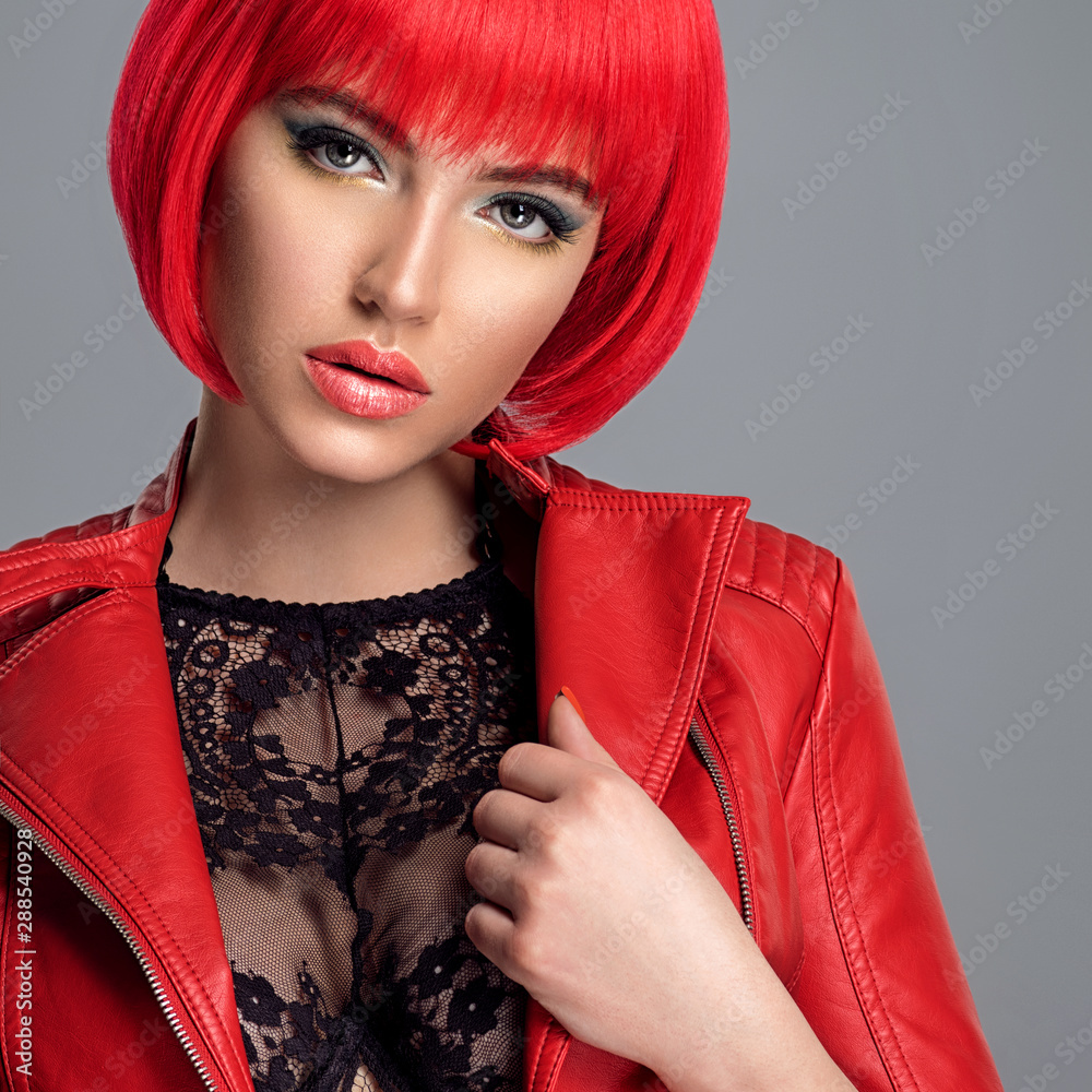 Wall mural beautiful sexy woman with bright red bob hairstyle. fashion model.