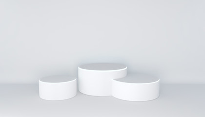White three-level podium with luminous strip on a white background. Three simple cylindrical pedestals for product presentation. 3D rendering.