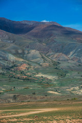 Different colored mountains in near Mongolian Altai mountains, Russia.