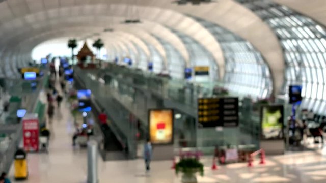 Airport background a interior modern airport with a lot of business people travel in Bali, Indonesia. concept man and woman with luggage, suitcase, advertising