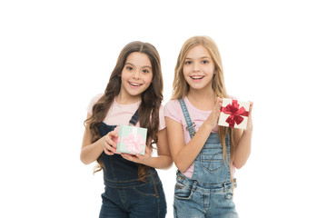 Girls sisters or friends hold gift boxes. Girls open holiday present. Children cheerful hold presents. Opening gifts. Perfect present for teens. Shopping day. Birthday present. For my dear friend