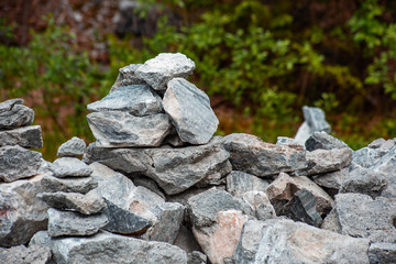 A pile of real pyramid shaped stones, soft focus