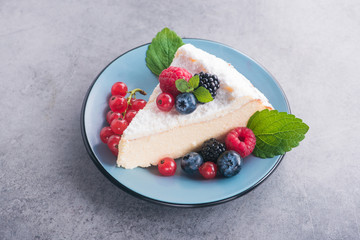 Sweet dessert cake with blackberry, raspberry, currants