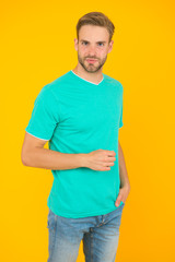 Modern male hairstyle. Hairstyle for hipster. Handsome man yellow background. Well groomed guy with...