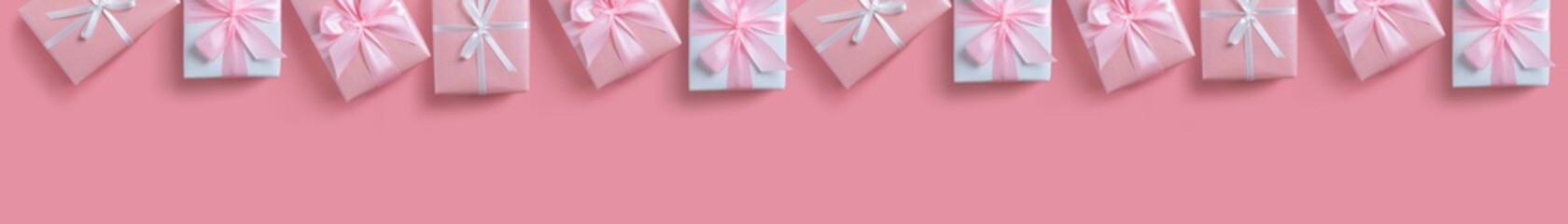 Panoramic, Banner of gift boxes on pink isolated background