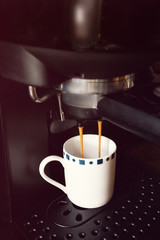 Coffe Cup inside of an Espresso Coffee Machine