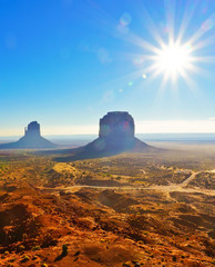 Fototapeta premium View of Monument Valley on a sunny day near the border of Arizona and Utah in Navajo Nation Reservation in USA.
