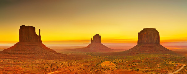View of Monument Valley at sunrise near the border of Arizona and Utah in Navajo Nation Reservation...