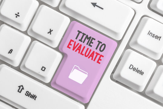 Handwriting text Time To Evaluate. Conceptual photo judge something with respect to its worth or significance White pc keyboard with empty note paper above white background key copy space