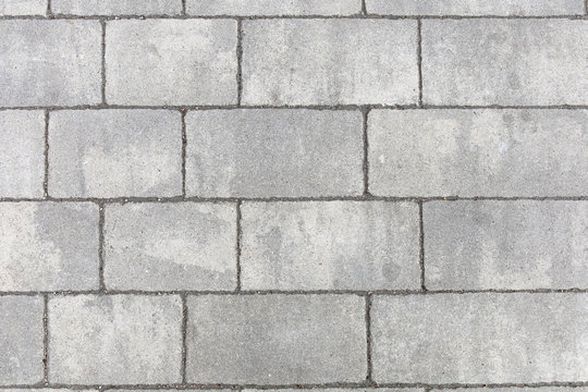 gray rectangular stone of modern paving slabs, background, texture