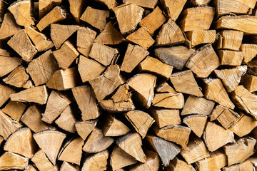 stacked pile of chopped firewood, background, texture