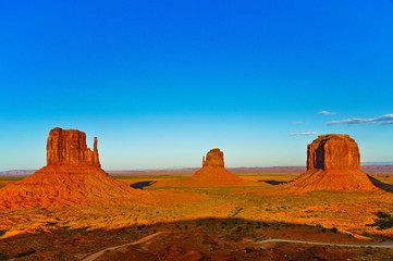 Fototapeta na wymiar View of Monument Valley at sunset near the border of Arizona and Utah in Navajo Nation Reservation in USA.