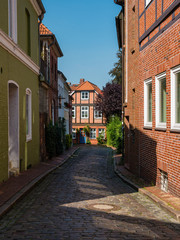 View at cobblestone street in historical center of Stade, Germany.
