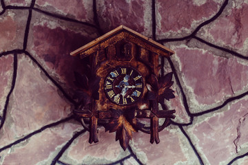 Fototapeta na wymiar Antique cuckoo clock on wall