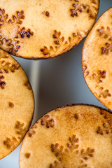 closeup view snowflake decoration on christmas mini cakes