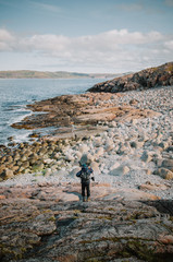 Fototapeta premium man on a rock