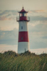 Lighthouse at List-Ost,  focus on foreground - Sylt, Germany © Marius Faust