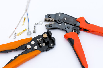 Tool for crimping and stripping electric wires