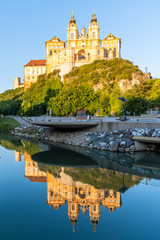 Melk Abbey, German: Stift Melk, reflected in the water of Danube River, Wachau Valley, Austria