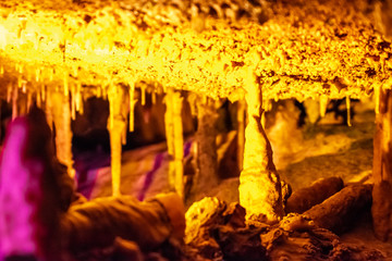 Formations of stalactites and stalagmites in a cave