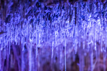 Formations of stalactites and stalagmites in a cave