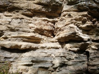 Stone rock texture of gray and yellow color