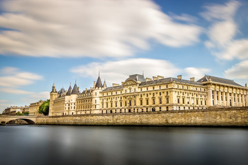 Fototapeta na wymiar Monumental Beauty - the Palais de Justice Looming over the Banks of Seine (UNESCO World Heritage)