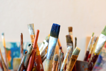 Paint brushes with different colors, closeup - 288565589