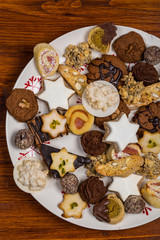 Assorted Christmas cookies on wooden table