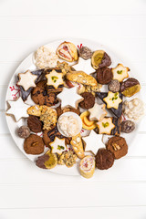 Assorted Christmas cookies on wooden table