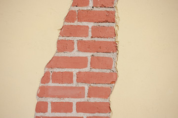Texture of damaged brick wall