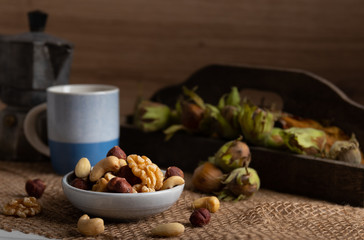 Variation of nuts on a autumn background