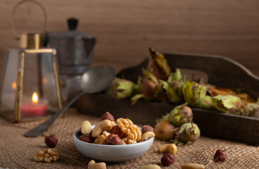 Variation of nuts on a autumn background