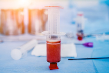 Platelet-Rich plasma preparation. Plasma in syringe. Centrifuge.