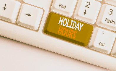 Text sign showing Holiday Hours. Business photo showcasing employee receives twice their normal pay...
