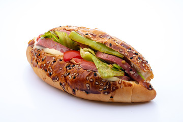 salami sandwich with vegetables on white background