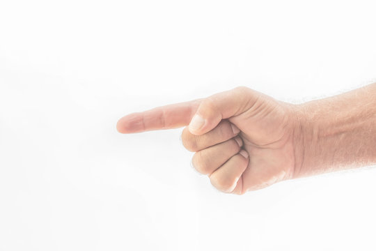 Detail of a man's hand pointing with the index finger on a white background. Space to write.