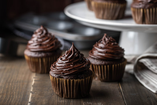 Chocolate Cupcake On Dark Wooden Background